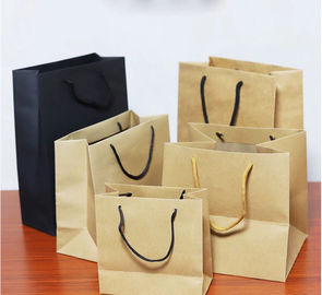 Resistência de rasgo alta amigável impressa de Eco dos sacos de papel de Kraft da durabilidade costume alto fornecedor
