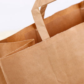 Corda lisa a favor do meio ambiente impressa costume da mão dos sacos de papel de Kraft fornecedor