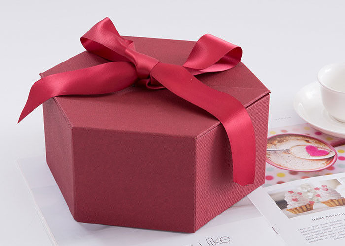 Tamanho impresso costume 24,5 * 21,3 * 10.5cm das caixas de presente do hexágono com fita fornecedor